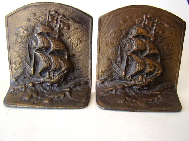 A pair of antique ship bookends by Bronze Met circa 1924